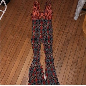 Reselling free people jumpsuit